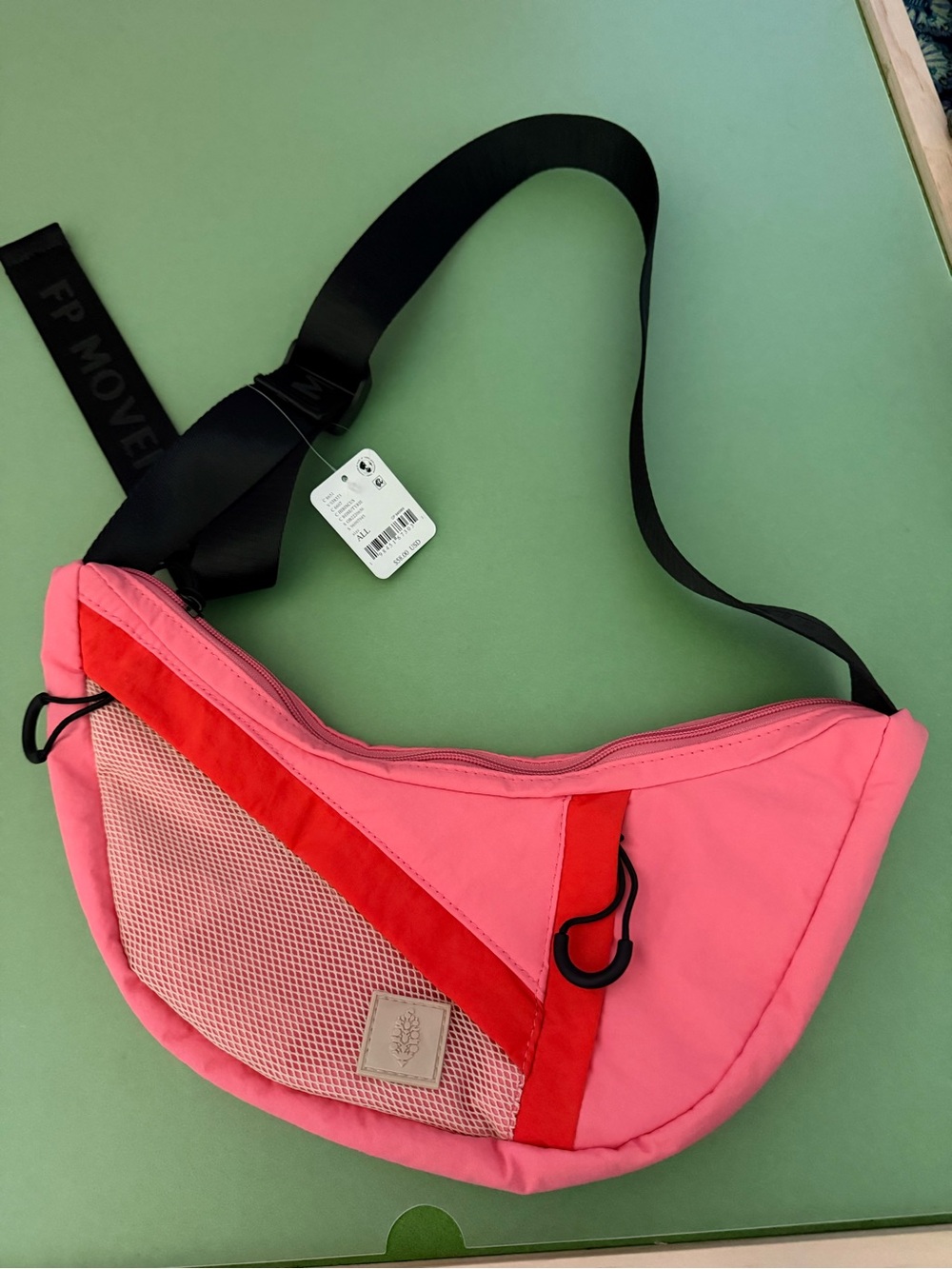 FP Movement Nothin but Net sling bag in Hibiscus